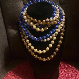 Set (4) Long thread necklaces (silk?) with gold beaded accent